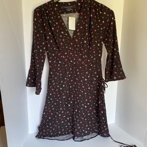 Black 3/4 length sleeves slight flare , ties cloth dress